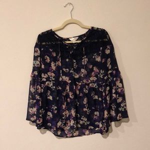a floral blouse that screams confidence!!